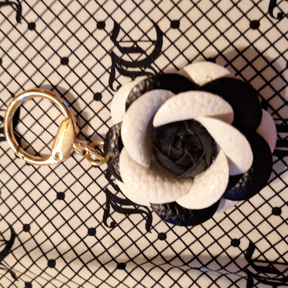 Elegant Black and White Flower Keychain